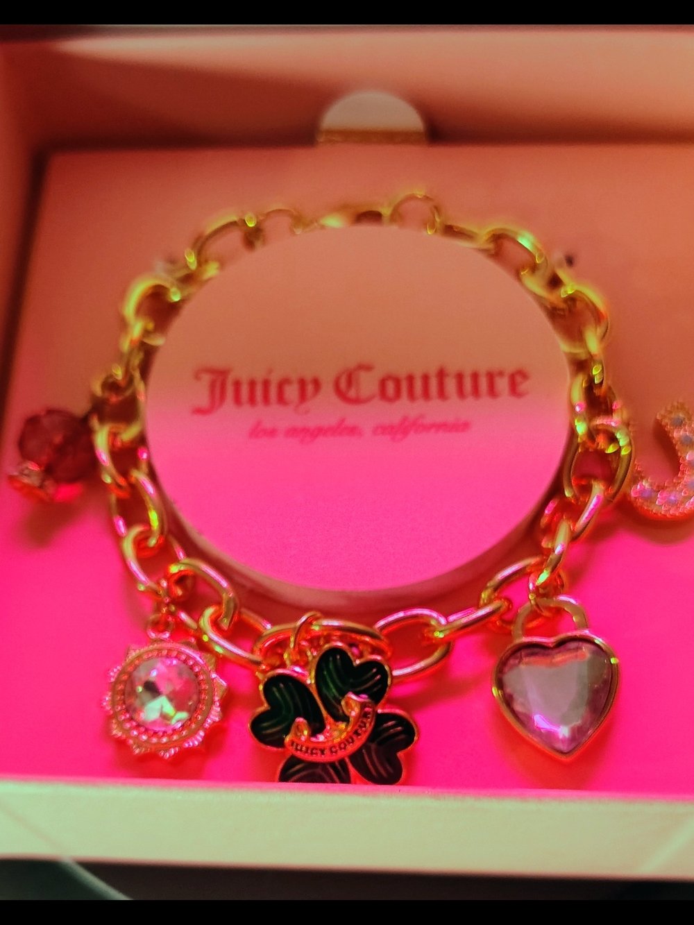 Juicy Couture Gold-Tone Charm Bracelet with Pink Crystal Heart and Black Clover